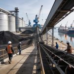 Create an editorial news illustration for an article about 'Extension du Môle Est : Congo Terminal innove face aux sables bitumineux'. The specific country is Republique du Congo (Brazzaville) (CG); make visual cues accurate to this exact country and