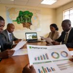 Create an editorial news illustration for an article about 'Gouvernance au Congo : L’ONG PCQVP exige plus de transparence dans la gestion des ressources naturelles'. The specific country is Republique du Congo (Brazzaville) (CG); make visual cues acc