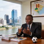 Create an editorial news illustration for an article about 'Les cinq défis du sport congolais exposés par le ministre Hugues Ngouelondélé'. The specific country is Republique du Congo (Brazzaville) (CG); make visual cues accurate to this exact countr
