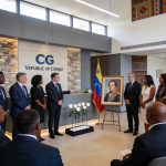 Create an editorial news illustration for an article about "Congo : double cérémonie à l'ambassade du Venezuela en mémoire de Simón Bolívar et des victimes du séisme". The specific country is Republiqe du Congo (CG); make visual cues accurate to this